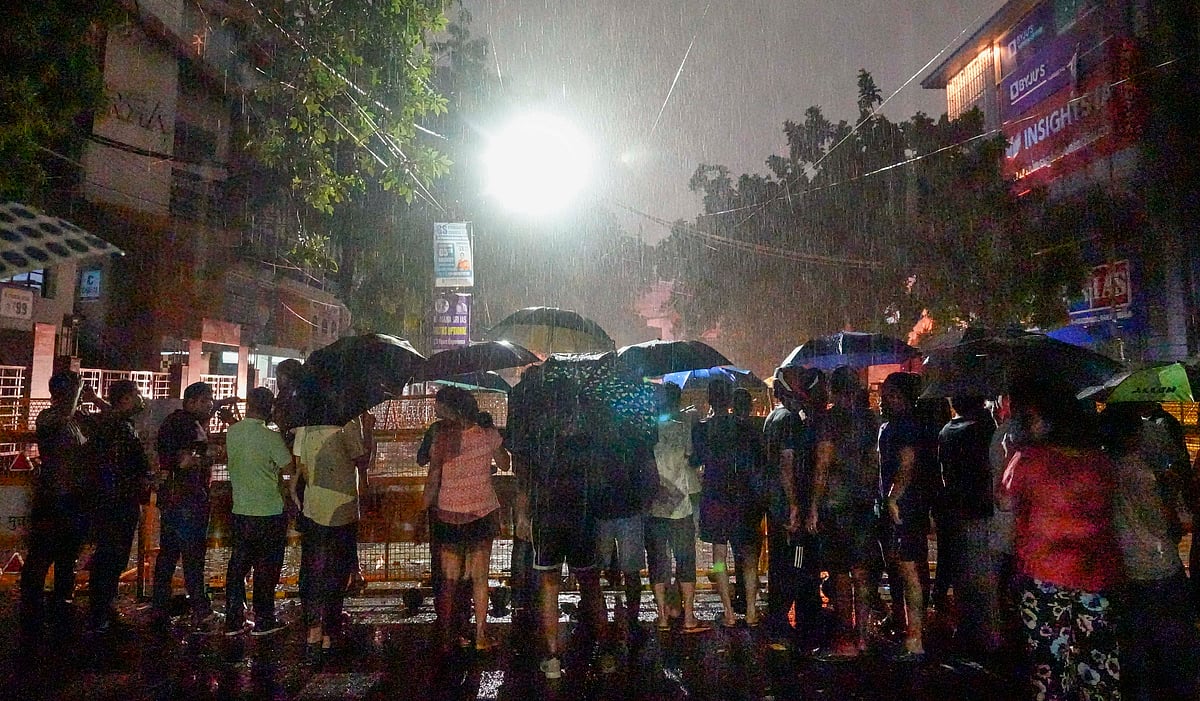 PTI : Students protest at a barricaded road near Rau's IAS Study Circle at Old Rajinder Nagar during rain, in New Delhi, Wednesday, July 31, 2024